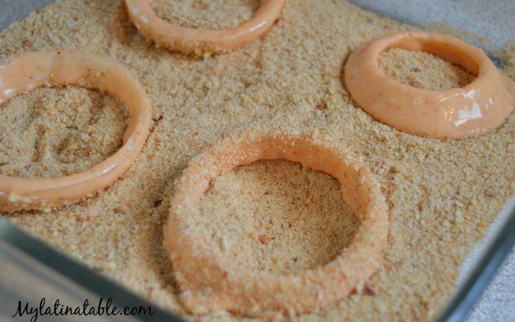 Adding breadcrumbs to onion rings