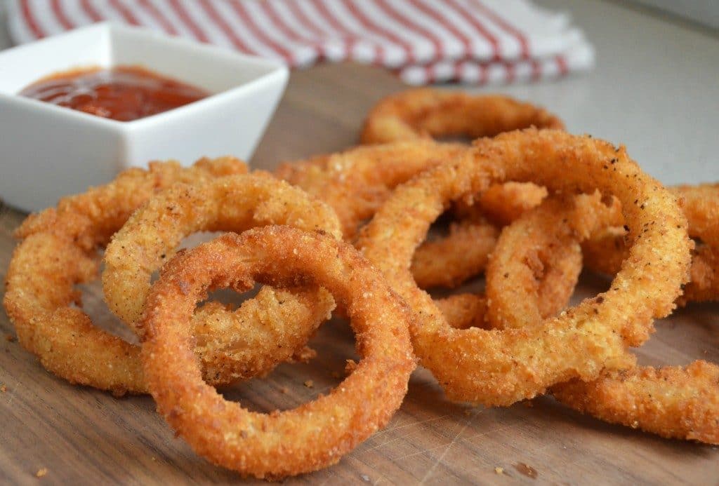 Homemade Extra Crispy Onion Rings are one of my favorite appetizers to make - especially for game time parties and more.