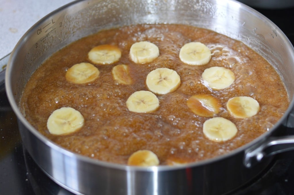 bananas foster sauce with bananas in a pan