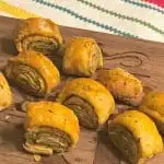 Easy Olive Oil and Garlic Puff Pastry Pinwheels are full of flavor and a perfect side dish for your barbecues this year.
