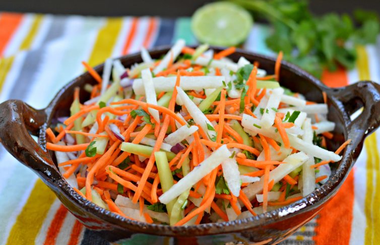 This Jicama and Cucumber Slaw is a perfect side dish for all of your summer favorites - it is fresh, crunchy, and delicious.