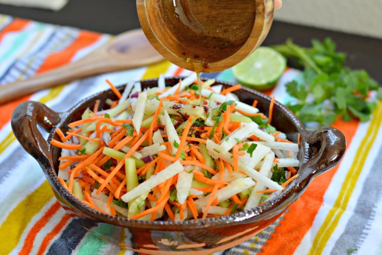 This Jicama and Cucumber Slaw is a perfect side dish for all of your summer favorites - it is fresh, crunchy, and delicious.
