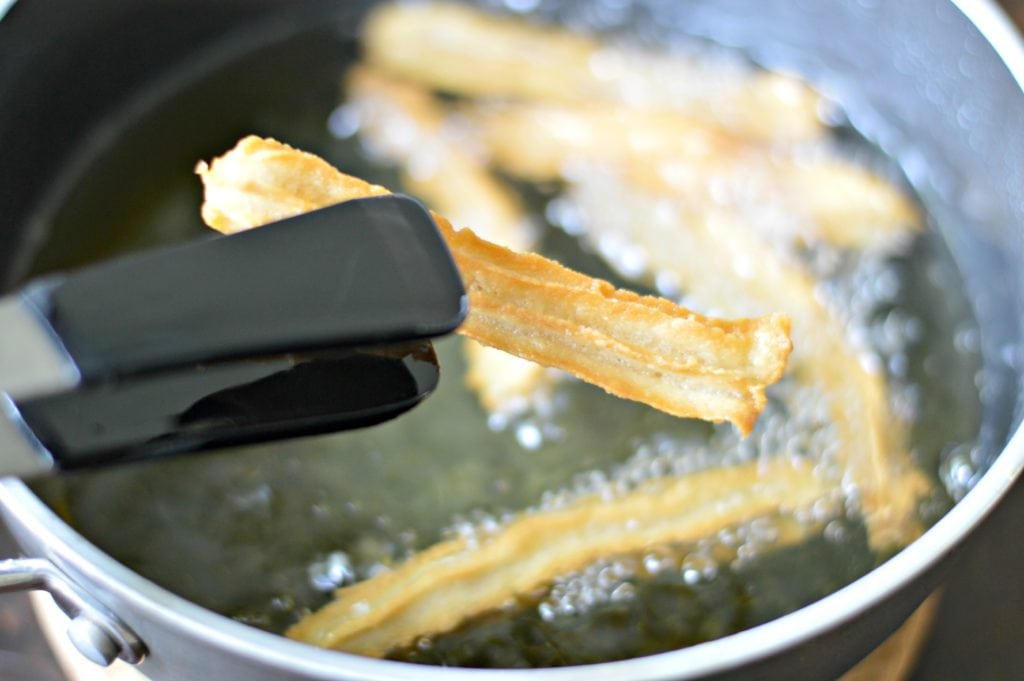 Frying the churros