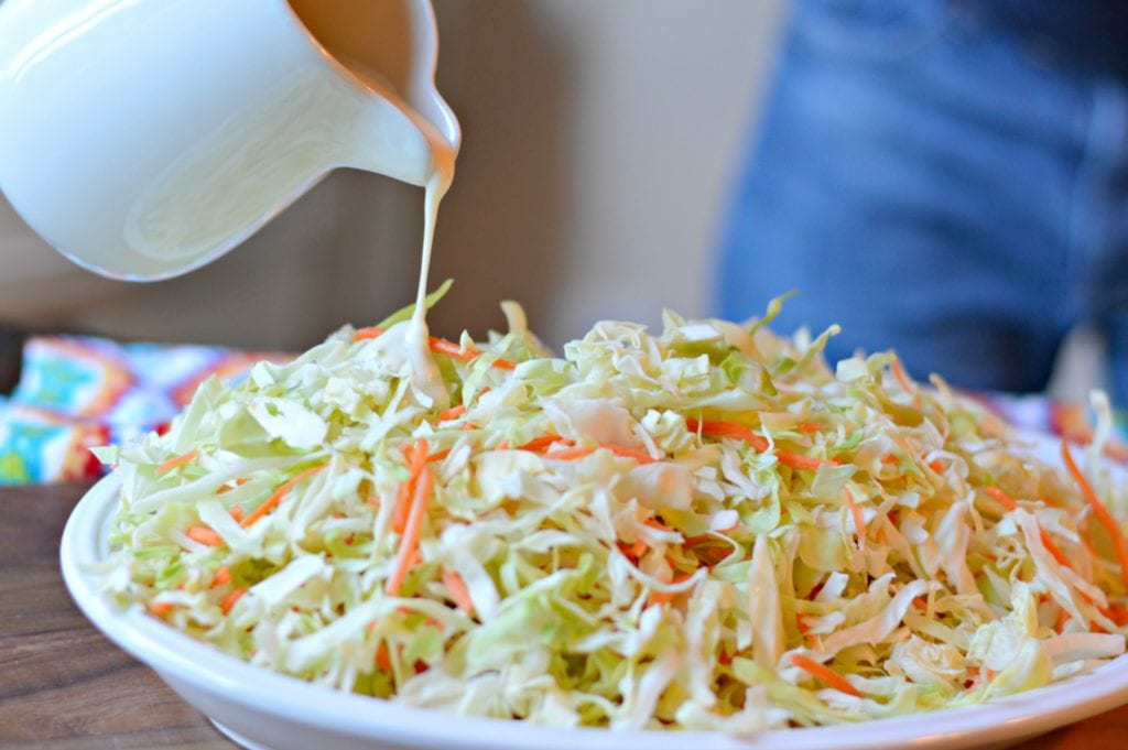 Adding dressing to coleslaw