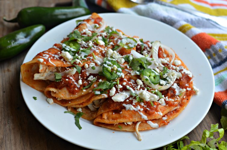 entomatadas on a plate with garnishes