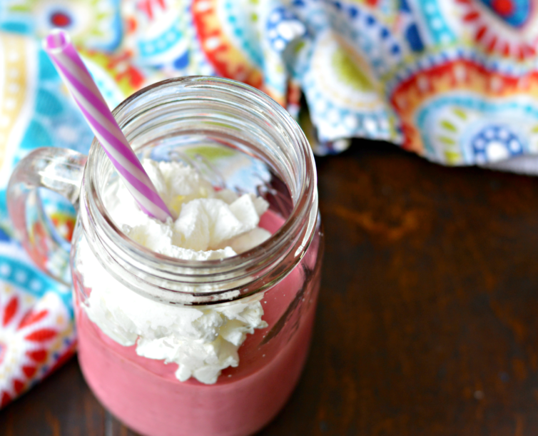 putting together the raspberry milkshake recipe
