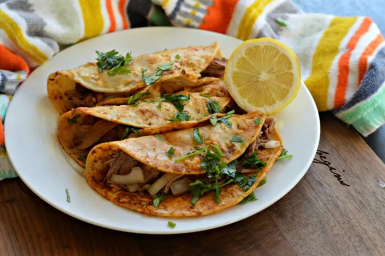 Birria Tacos with lemon