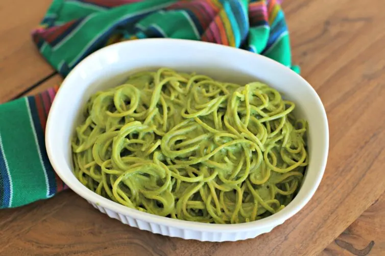 espagueti verde in a baking dish before adding the cheese