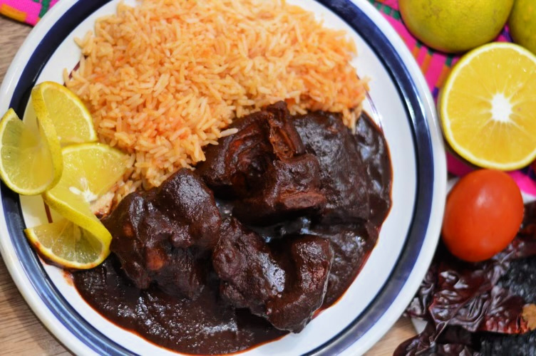 Mexican Pork Adobo with rice on a plate